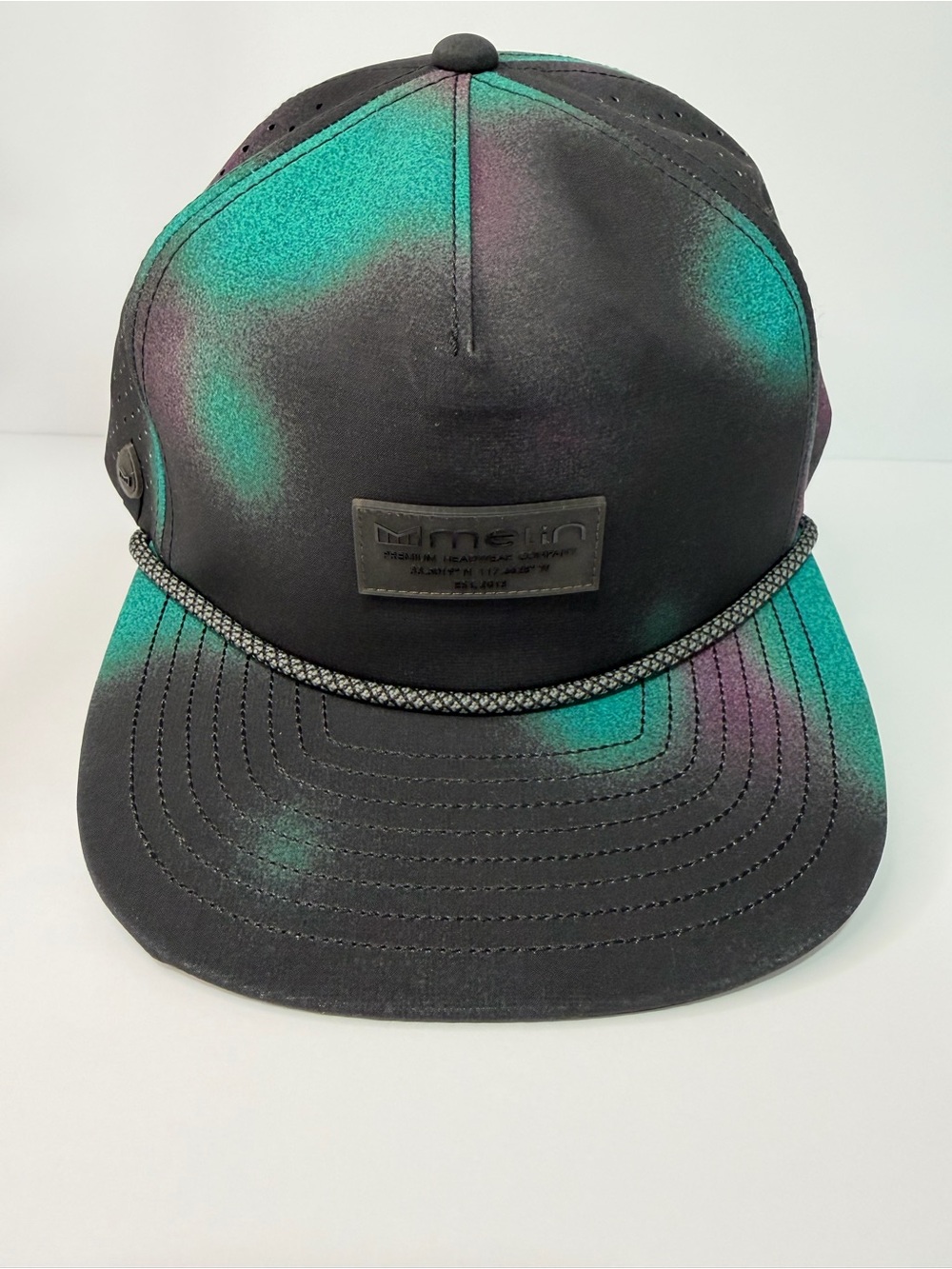 Melin Aura Black Cap with Teal and Purple Accents